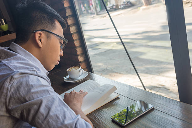 istock Reading book and having hot coffee is kind of relaxing 520586164