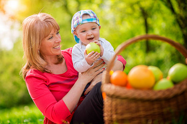 istock Mother and baby on a picnic 520587628