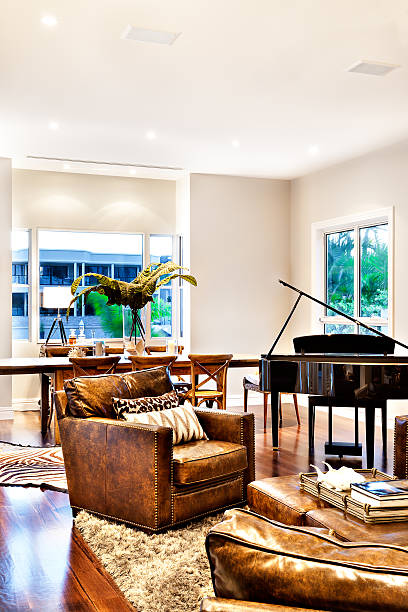 istock Beautiful sofa set with a with piano in a room 520587664