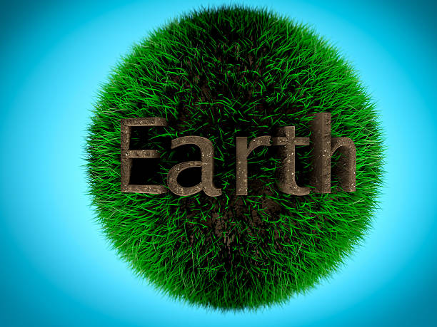 istock Earth written by soil on grass ball. Concept of environment 520587736