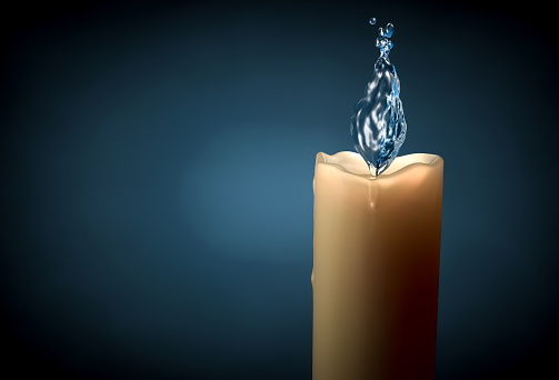Conceptual shot of candle with water and bubble flame