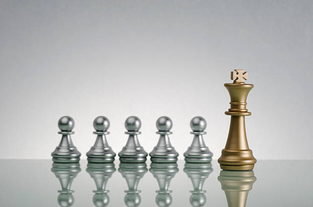 istock Golden King and  Silver Pawn - Leadership Concept 520590168