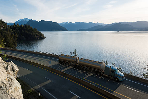 istock Transport truck driving along Highway 99, BC, Canada 520591134