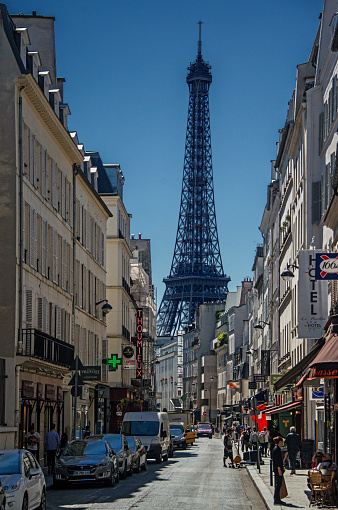Paris, France - July 10, 2015: Walking around the streets of Paris with an exceptional view of the Eiffel Tower