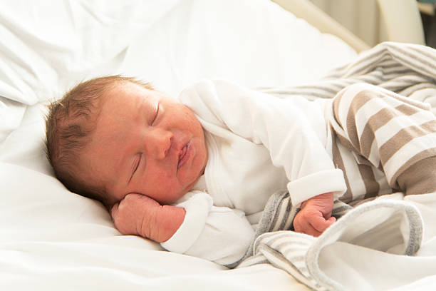istock Sleeping 1 day old baby boy 520594642