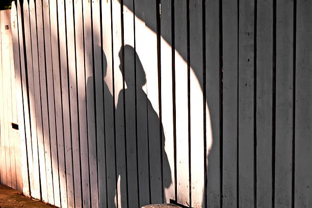 istock shadow of a boy with mother 520600071