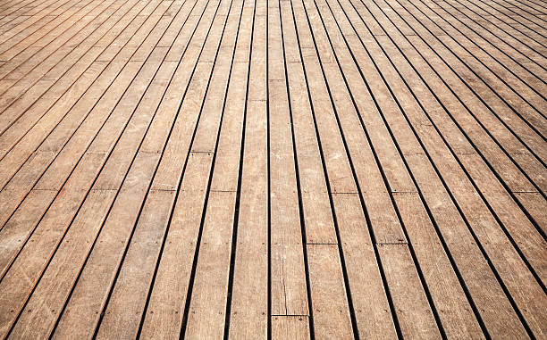 istock Old wooden floor perspective. Background texture 520602331