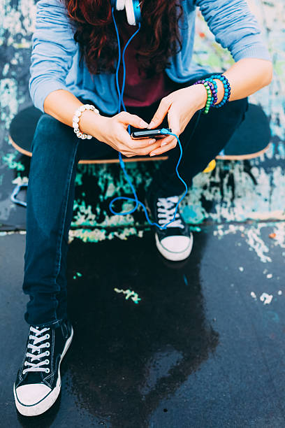 istock Girl texting at smartphone 520602729