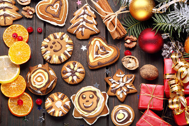 istock Christmas decoration with gingerbread on wooden background 520602987