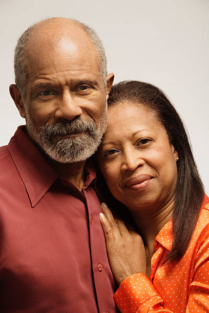 istock Couple with eyes closed, smiling, close-up 520605929