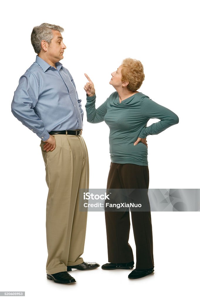 Senior woman pointing finger at man Blame Stock Photo