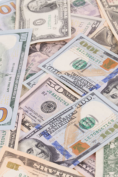 istock Close up of different dollar bills. 520609142
