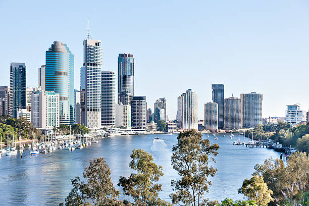 istock Brisbane City building with river around trees at sunny day 520610446