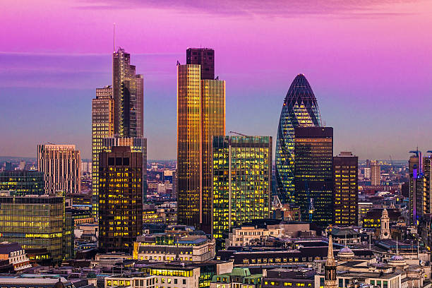 City of London City of London one of the leading centres of global finance.this view includes :Tower 42 Gherkin,Willis Building, Stock Exchange Tower and Lloyd`s of London london gherkin at night stock pictures, royalty-free photos & images