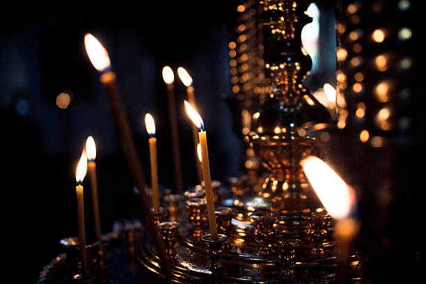 istock Candles burn in Church 520613700