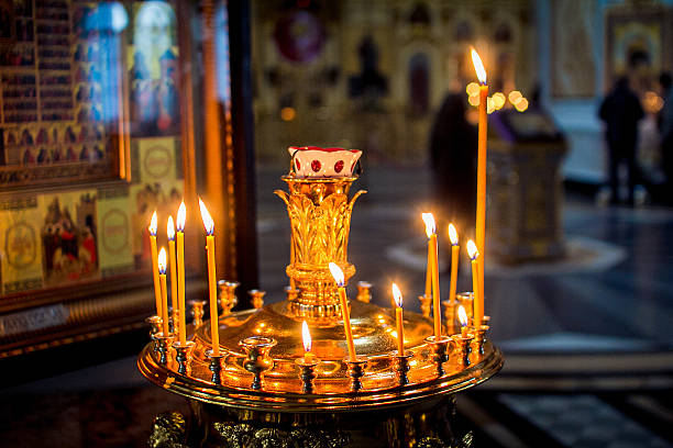 istock Candles burn in Church 520613738