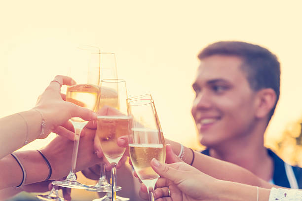 istock Group of friends drinking champagne. 520614064