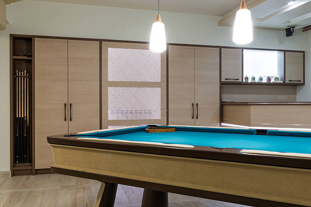 istock Entertainment room in luxury mansion with pool table 520615554
