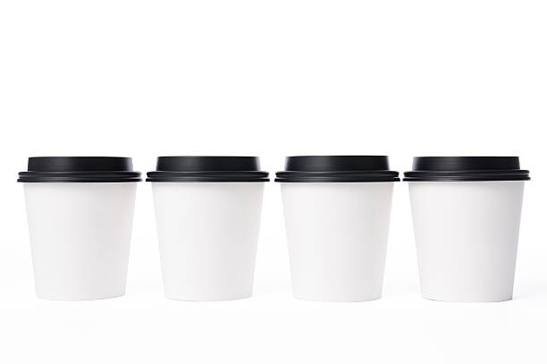 istock Isolated shot of four blank disposable cup on white background 520617498