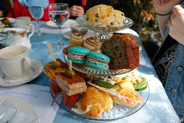 traditional high tea baby shower served in the garden - gourmet pastry bread horizontal imagens e fotografias de stock