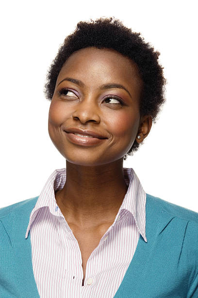 istock Young woman looking to side, smiling, close-up 520617917