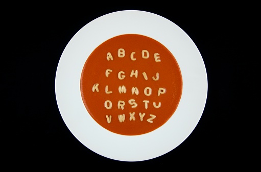 letters of the alphabet in tomato soup
