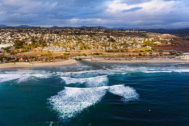 The community of Cardiff-by-the-Sea, California, a neighborhood of the city of Encinitas in northern San Diego County.  This image was shot during a helicopter flight over the Pacific and depicts Cardiff State Beach.  