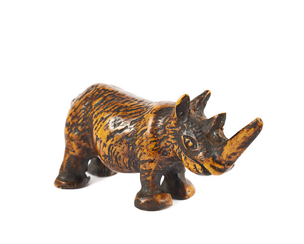 istock Rhinoceros rhino sculpture isolated 520618630