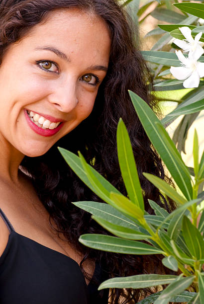 istock Beautiful woman in a park 520619525