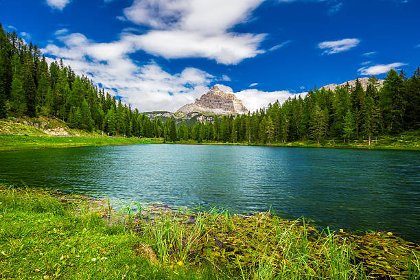 Antorno lake and The Tre Cime di Lavaredo in Dolomites stock photo
