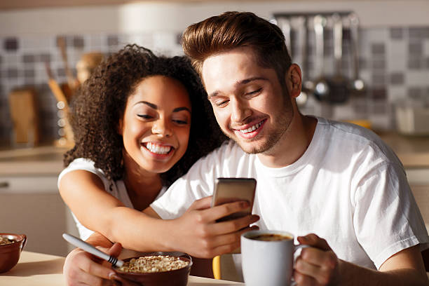 istock Pleasant couple sitting in the kitchen 520620740