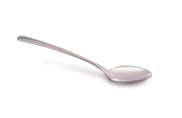 istock metal shiny spoon on white background 520621062