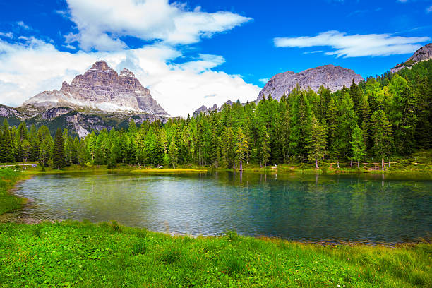 Antorno lake and The Tre Cime di Lavaredo in Dolomites stock photo