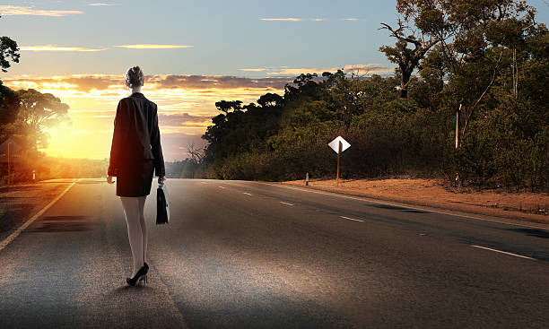 istock Businesswoman on road 520621225