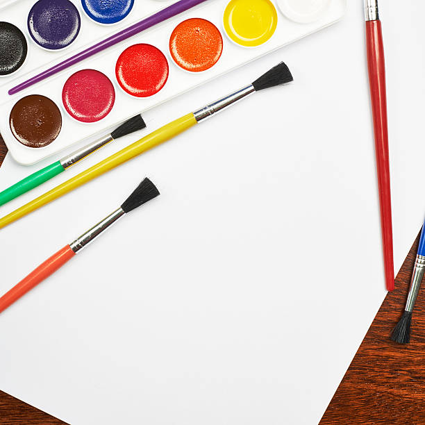 istock Blank sheet of paper covered with brushes 520621606