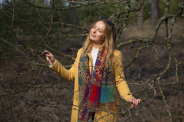 istock Little cute girl walking through the forest. Spring, sun, portrait, 520621908