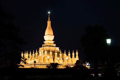 View of Pha That Luang (Great Stupa) at night in Vientiane, Laos. 