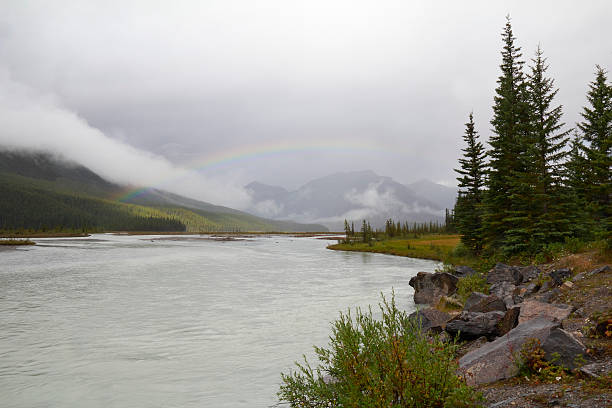 istock Rainbow Over a River Valley - Jasper National Park, Canada 520622255