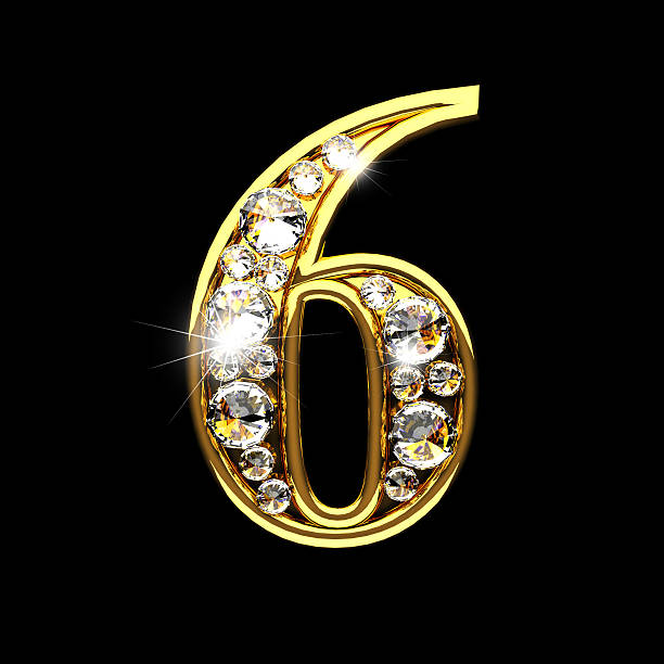 istock 6 isolated golden letters with diamonds on black 520623862