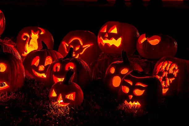 Photo of Lighted Halloween Pumpkins with Candles