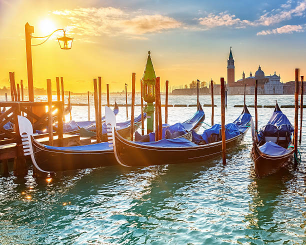 istock Venetian gondolas at sunrise 520637931