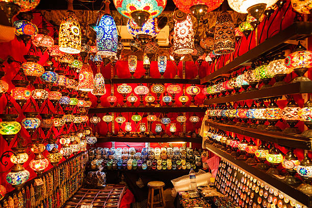 bazaar: lamps and lanterns Oriental turkish lamps and lanterns exposed into a red bazaar at Istanbul market grand bazaar istanbul stock pictures, royalty-free photos & images