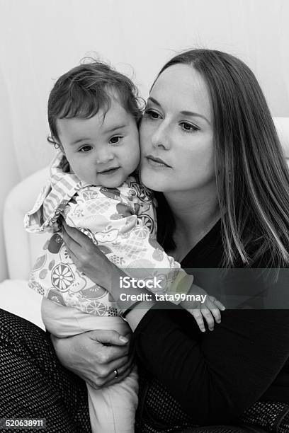 Happy Mother And Daughter Are Playing Together Stock Photo - Download Image Now - 12-17 Months, Adult, Autumn