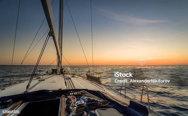 Sailing To Sunset Stock Photo - Download Image Now - Balearic Islands, Boat Deck, Coastline
