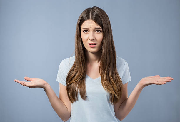 istock Gloomy girl  feeling puzzled 520646596