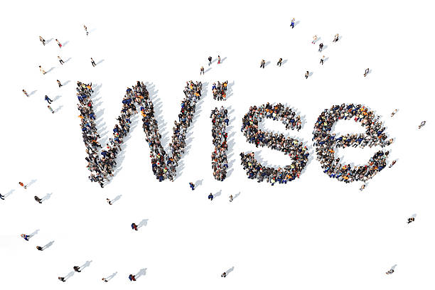 istock Group of people forming the word wise 520647470