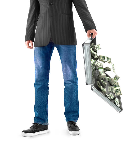 istock man holds a suitcase with dollars 520647718