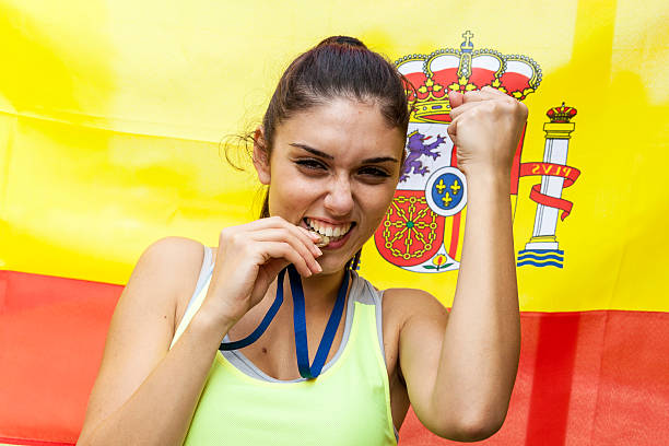 istock athlete shows the gold medal winner 520648034