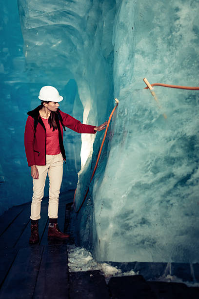 istock Scientist at an Expedition Site Examining a Glacier 520648388
