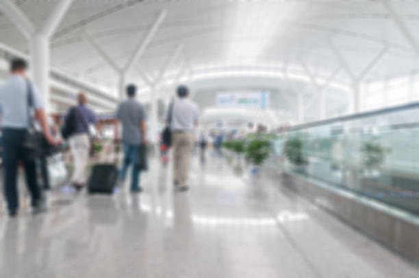 istock Blurred image of people in the airport 520648708